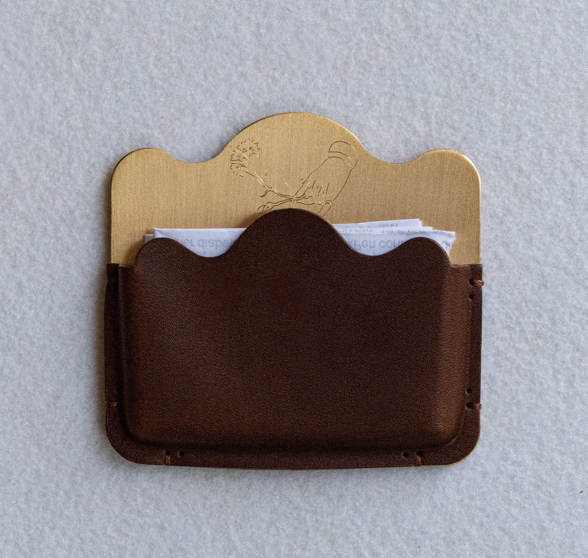 Brass card holder with brown leather