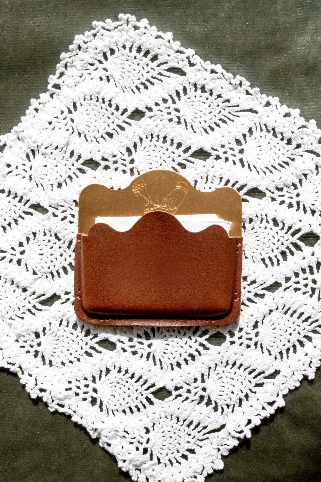 Brass card holder with brown leather