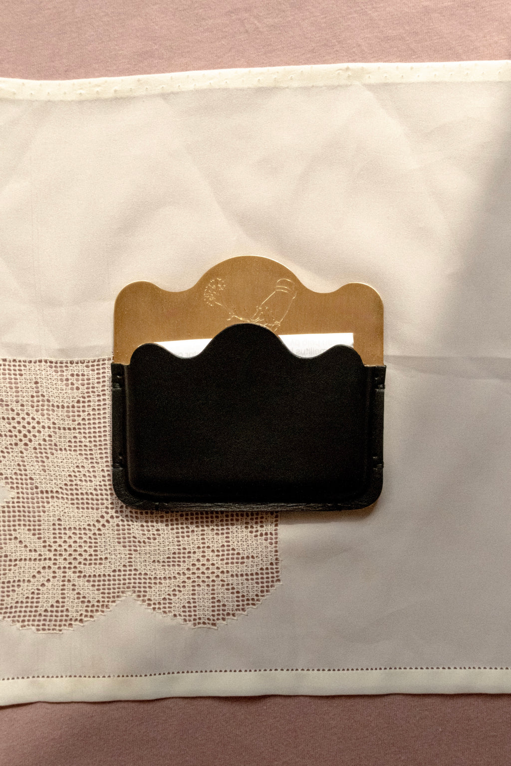 Brass card holder with black leather