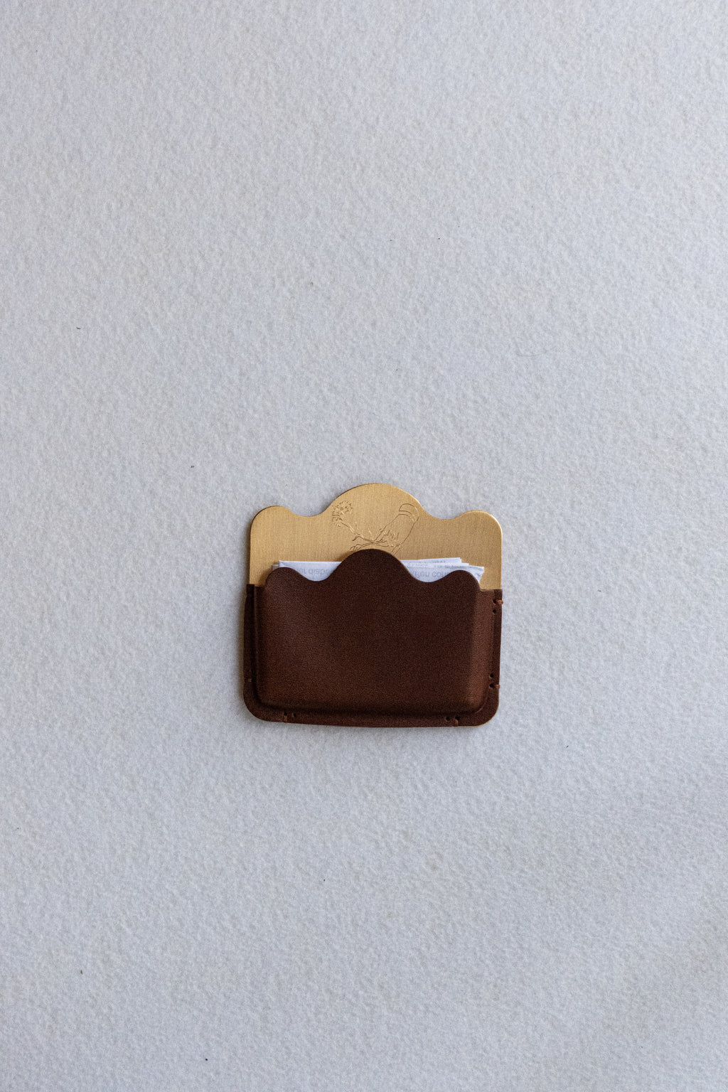 Brass card holder with brown leather