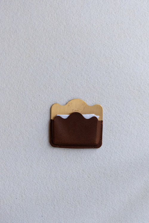 Brass card holder with brown leather