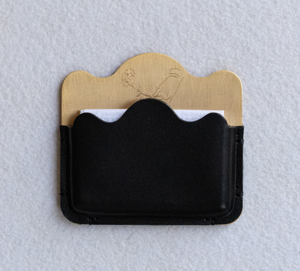Brass card holder with black leather
