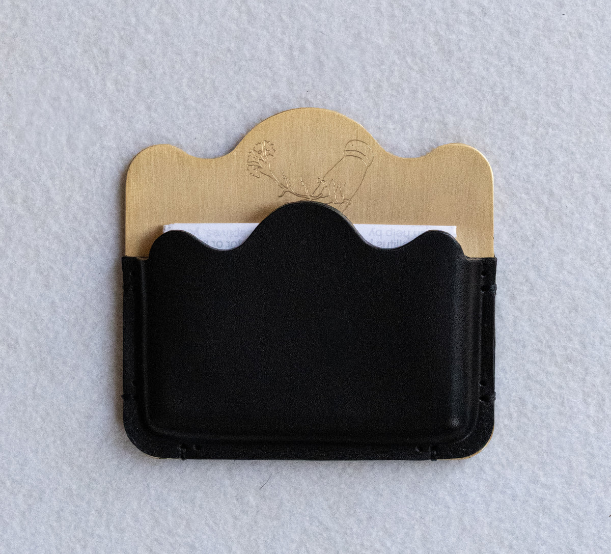 Brass card holder with black leather