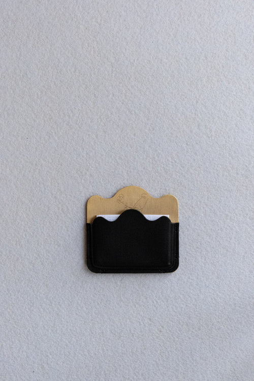 Brass card holder with black leather